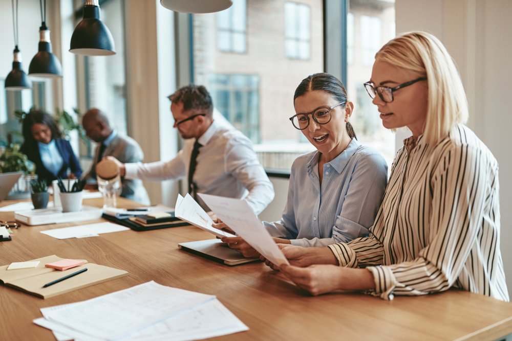 a business professional shaking hands, representing insurance services offered by Insurance Company Pickerington Ohio, specializing in comprehensive business insurance solutions.