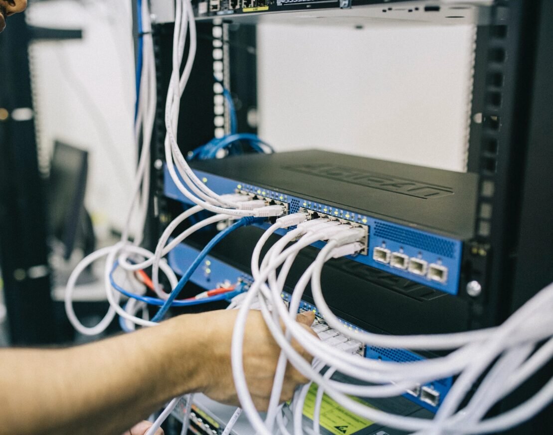 Cable installation professional working safely with tools, covered by general liability insurance in Pickerington, Ohio – ensuring protection and peace of mind for businesses.